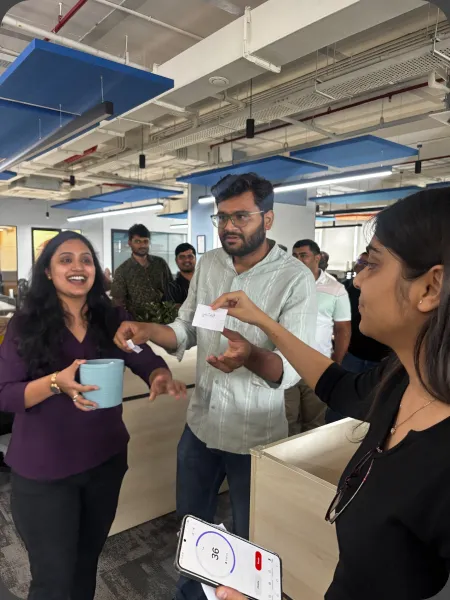 Colleagues chatting at the Infocusp office