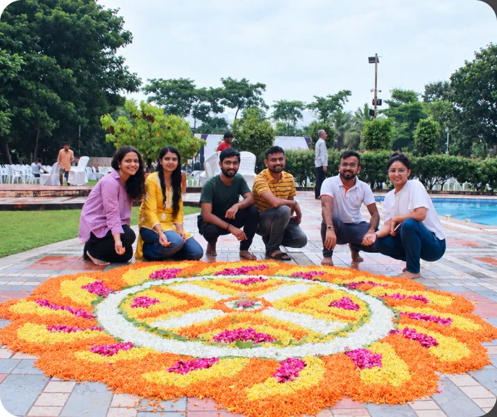 Team around a festive rangoli
